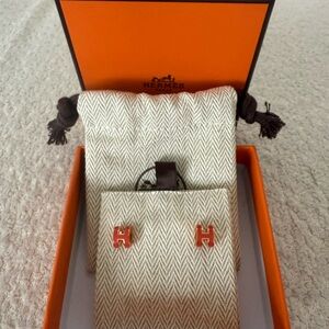 Hermès Signature H Earrings in Vibrant Orange